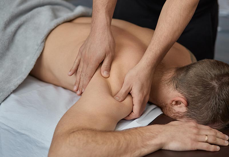 man being massaged, massage therapist bend oregon