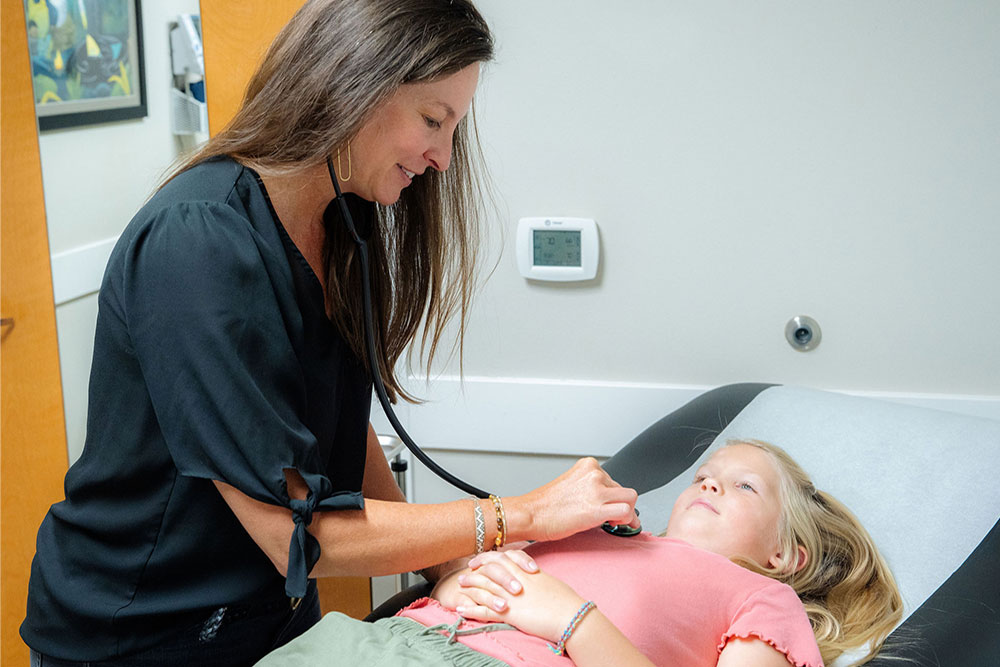 CFM provider with patient, primary care Bend Oregon